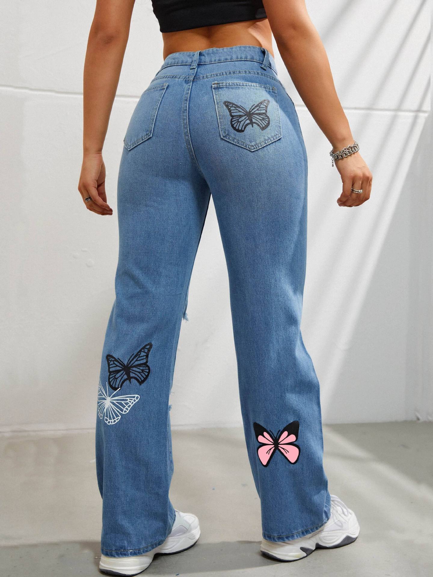 Clio - Trendy Butterfly Print Ripped Jeans
